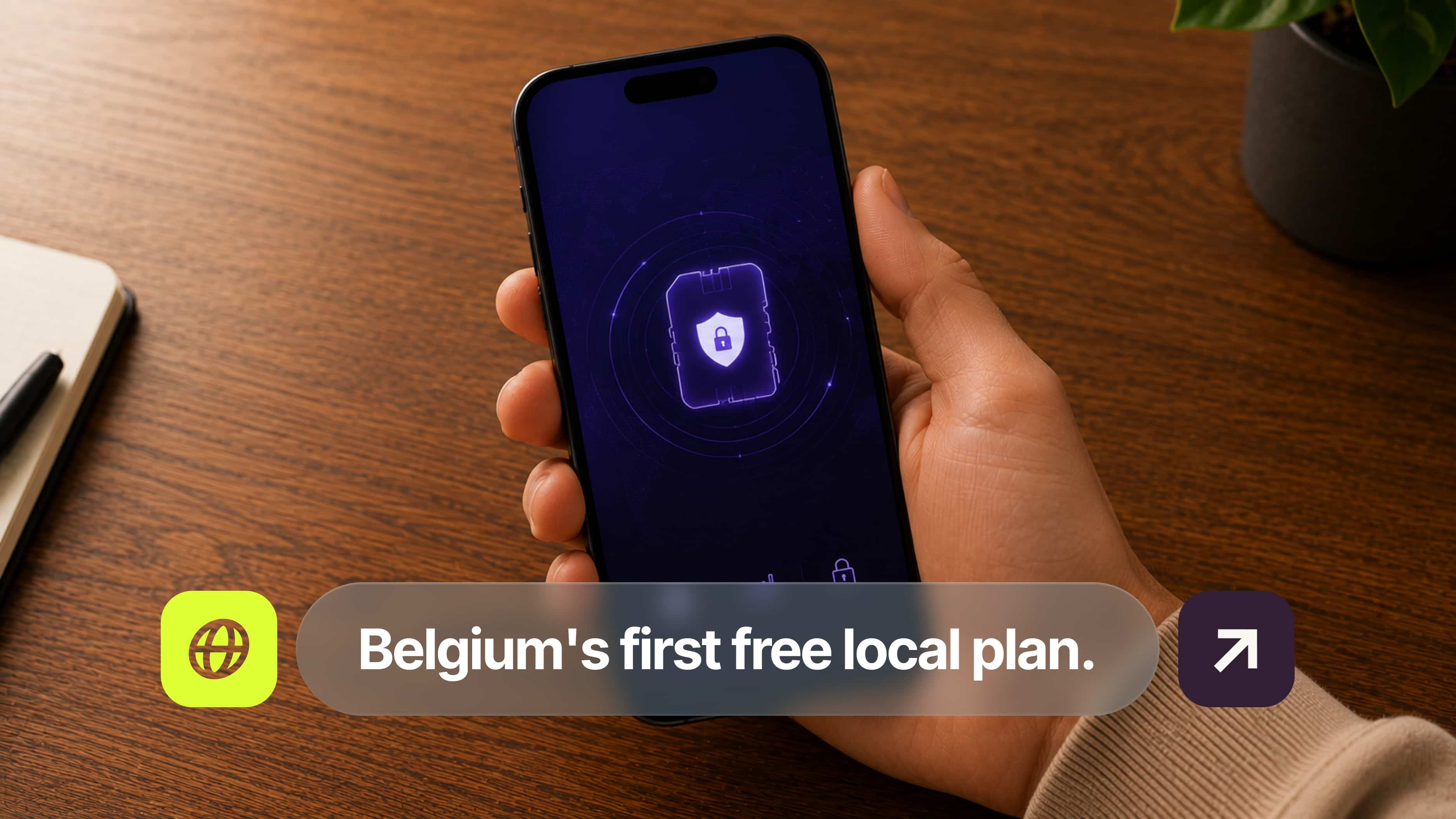 Hand holding a smartphone displaying a digital lock icon, with text: "Belgium's first free local plan" on a wooden table background.