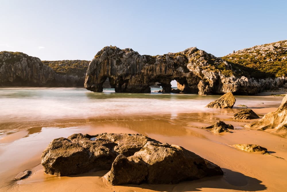 Sandy and rocky beach in Faro Portugal