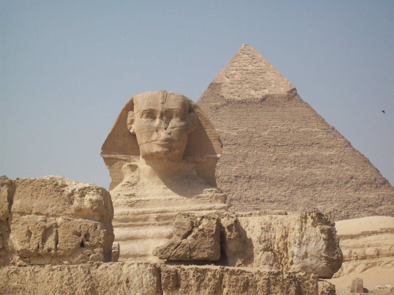 The Great Sphinx of Giza in front of the Pyramid of Khafre on the Giza plateau near Cairo