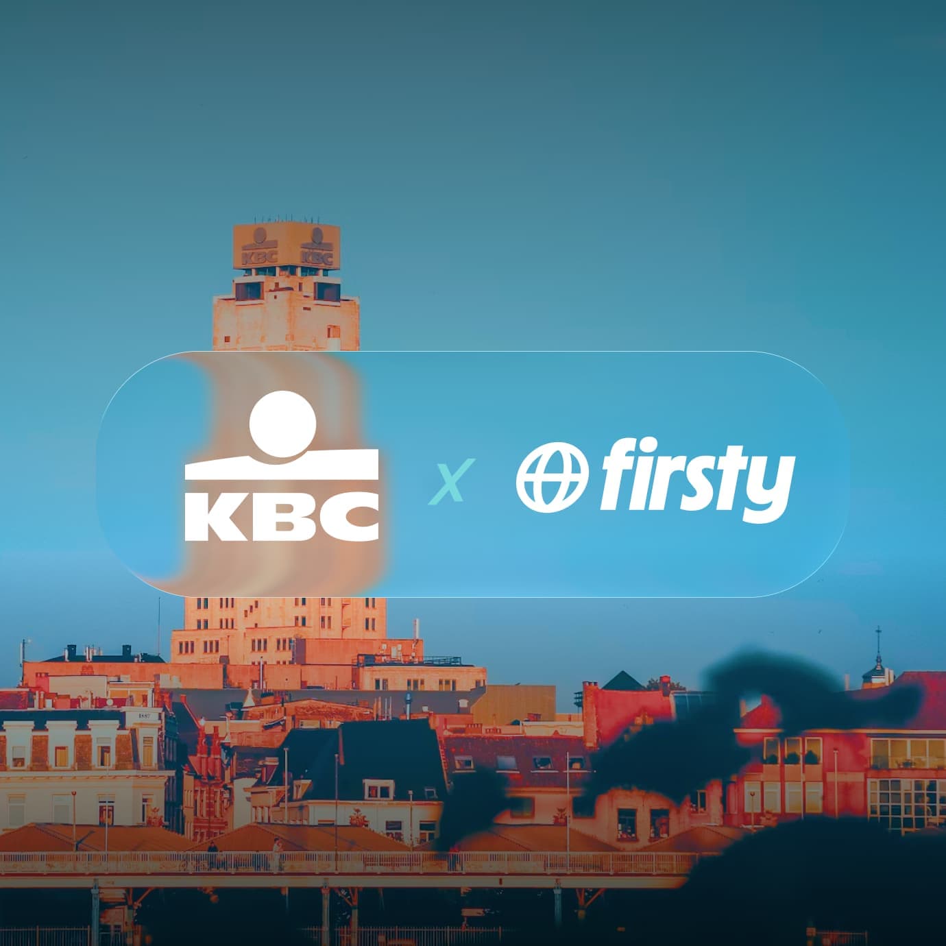 KBC and Firsty logos over the KBC tower skyline at dusk