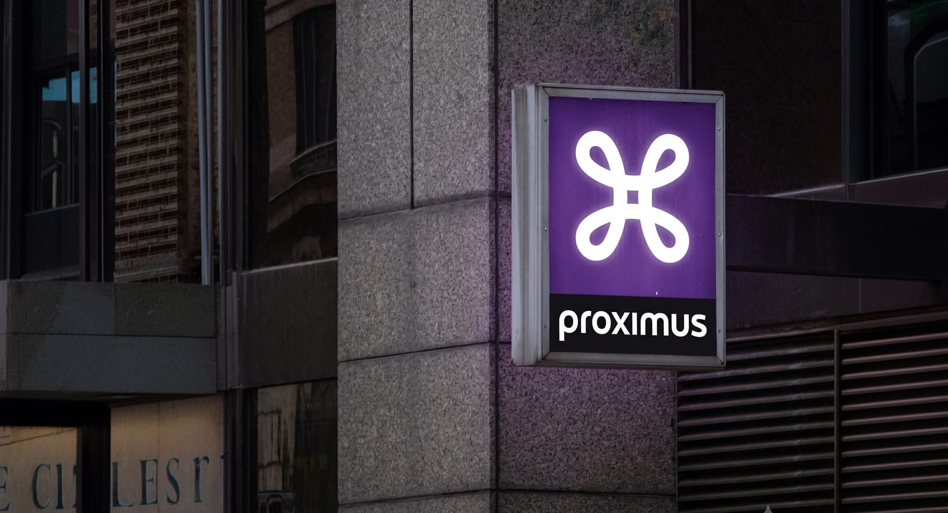 Proximus telecom sign mounted on a building in Belgium