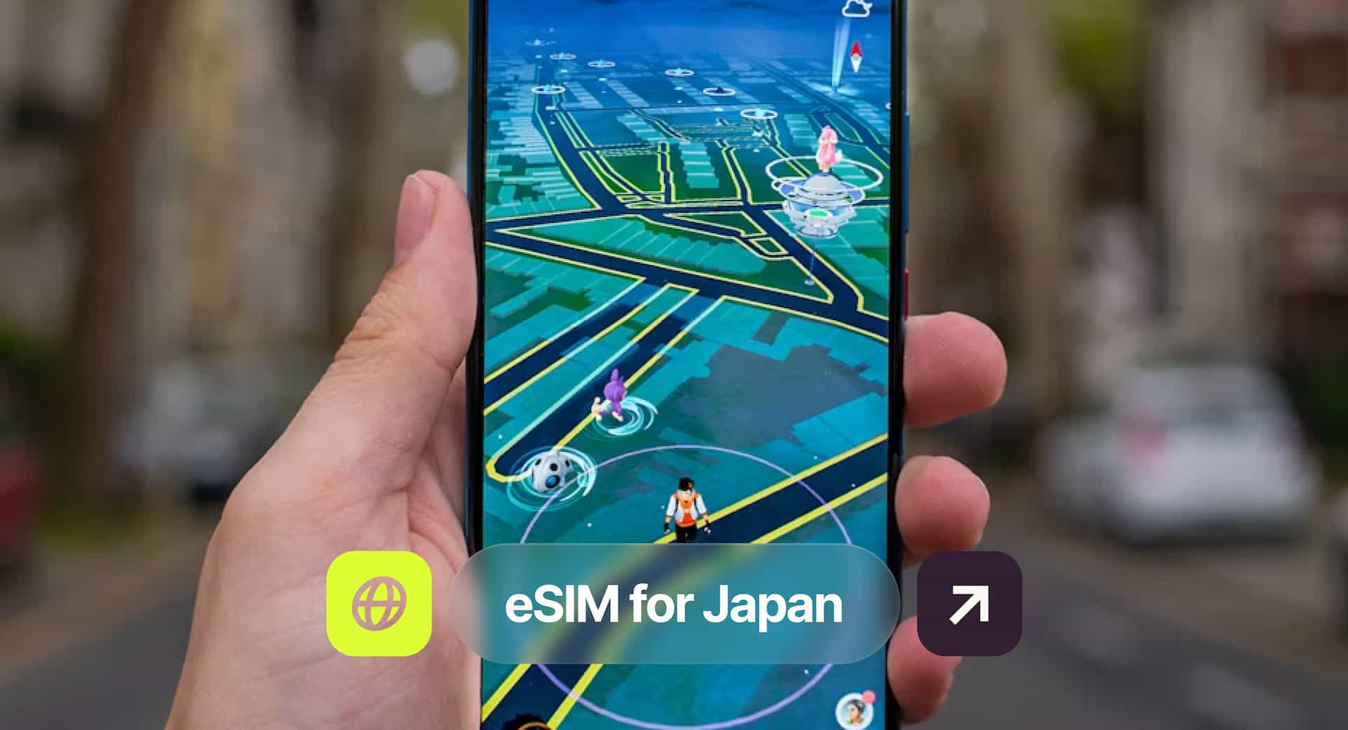 Hand holding a smartphone displaying a digital map with animated characters. Text overlay reads “eSIM for Japan.” Blurred street background.