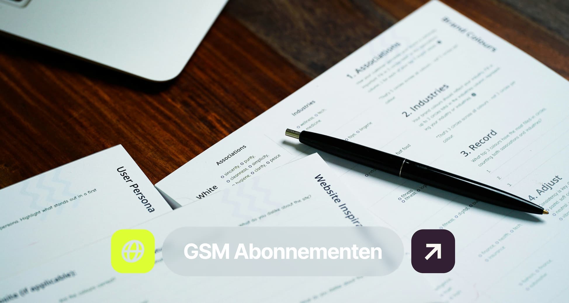 A pen rests on user persona and website inspiration documents on a wooden desk. Text overlay reads "GSM Abonnementen" with icon.