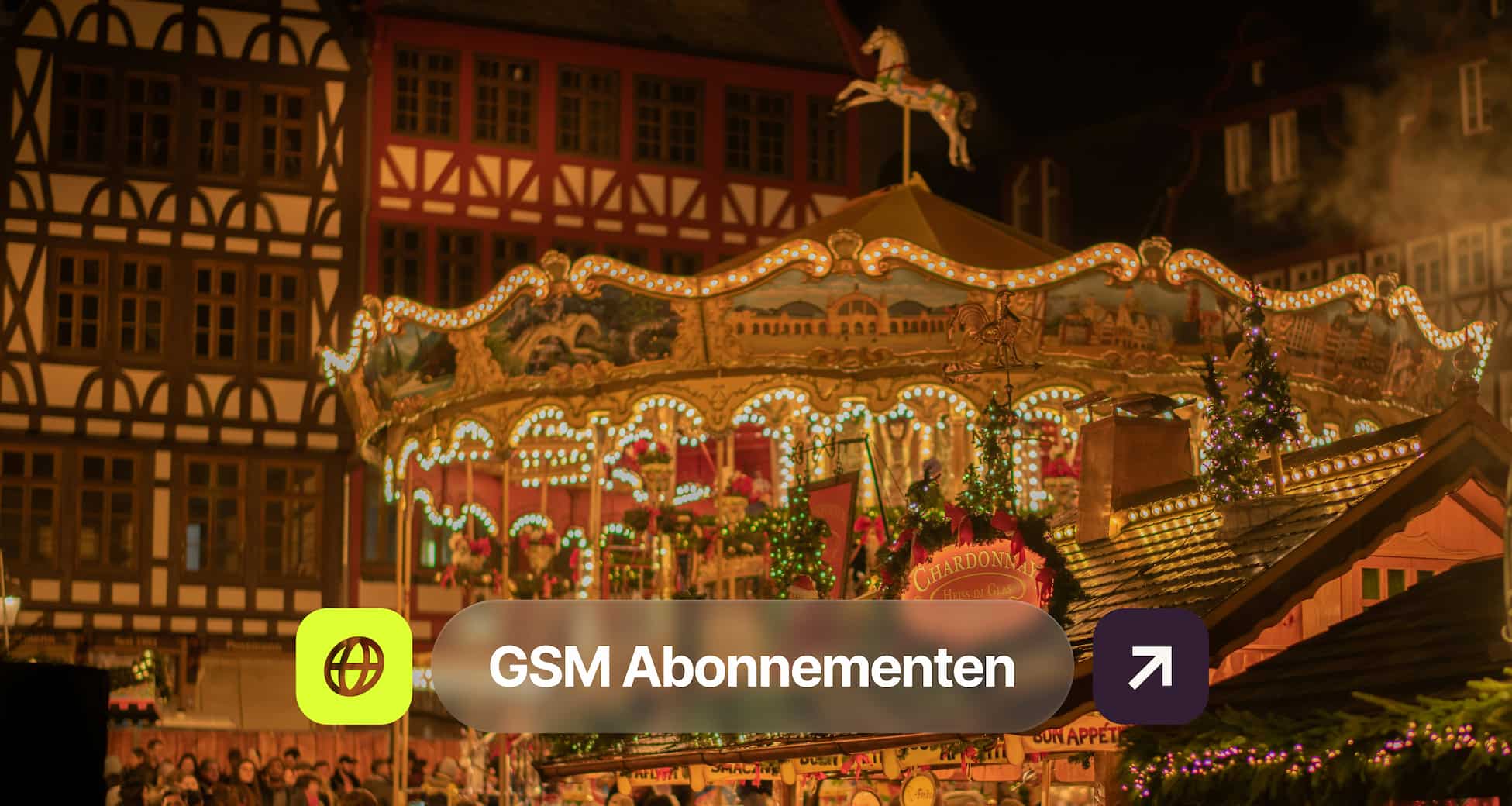 A brightly lit carousel with festive decorations at a nighttime Christmas market, surrounded by half-timbered buildings.