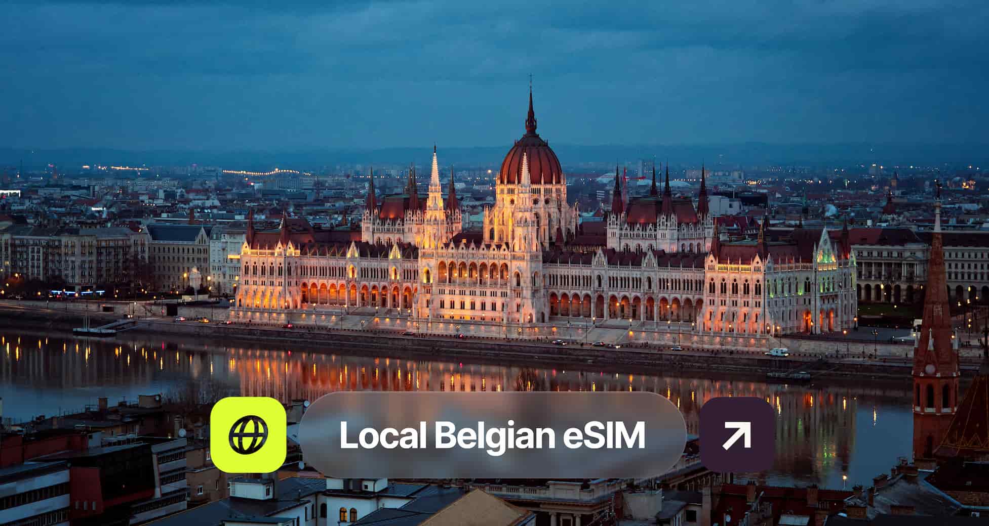 Illuminated building with Gothic architecture by a river at dusk, surrounded by a cityscape under a cloudy sky, with "Local Belgian eSIM" text overlay.