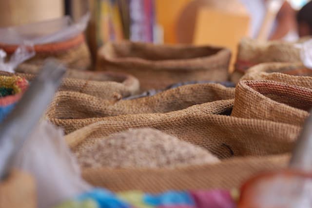 Bags filled with spices and portuguese cuisine, showscased within a market in Faro.