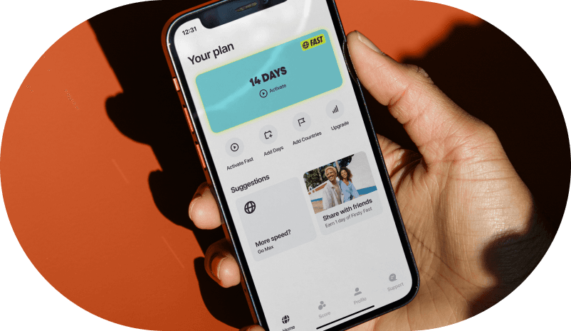 Firsty app showing a 14-day data plan on a phone held in hand